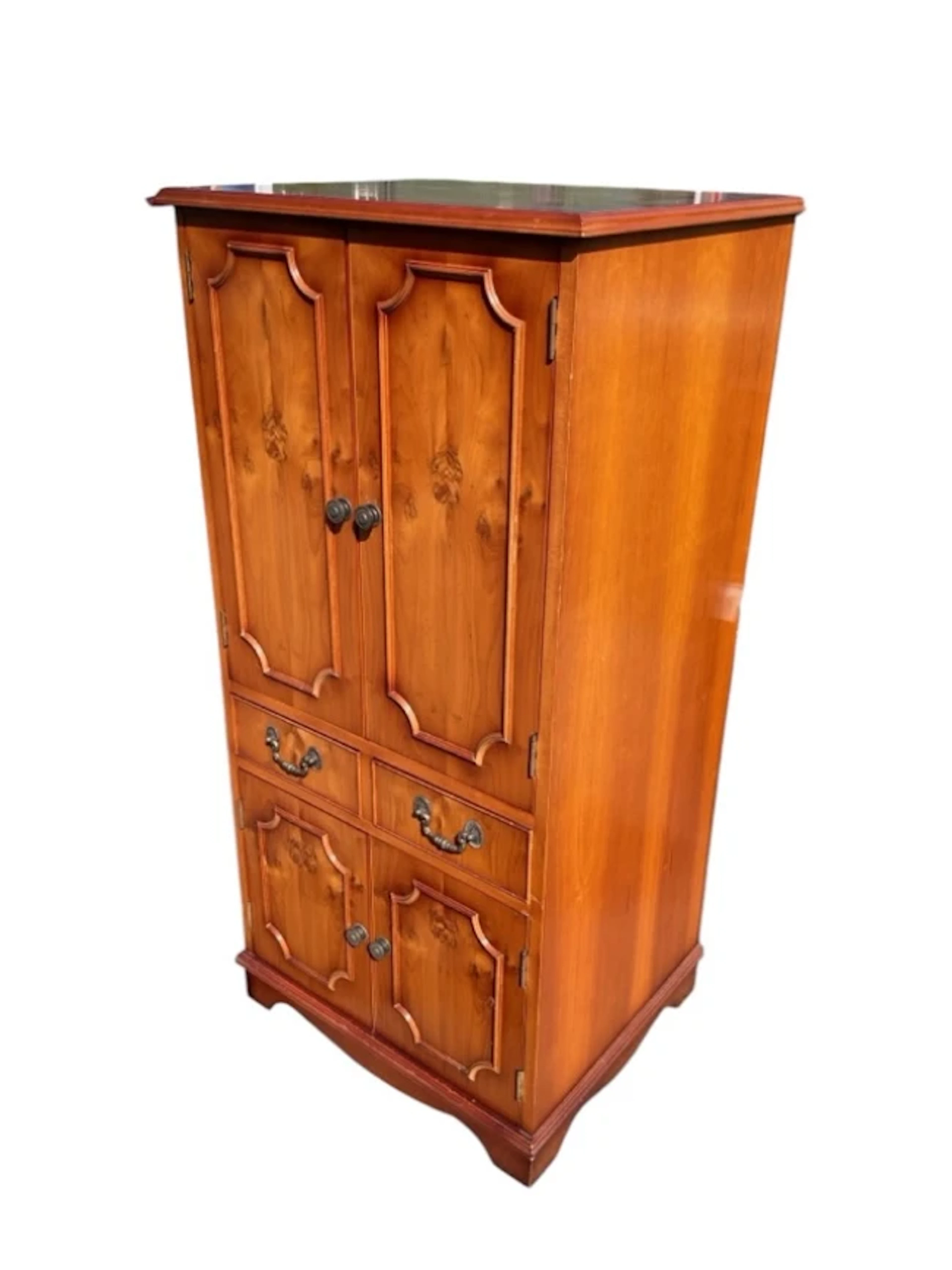 A contemporary yew cocktail cabinet with hinged rectangular top &