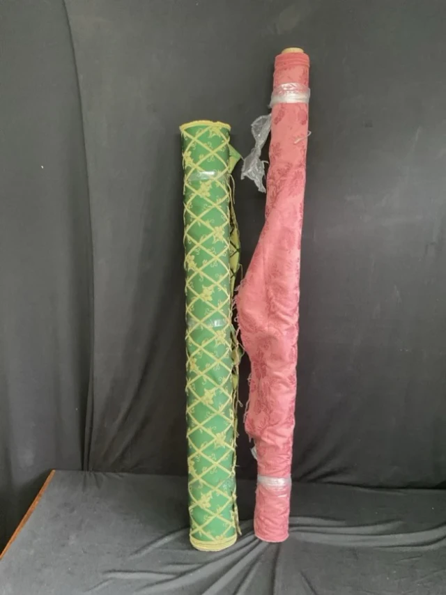 A roll of 49in green cotton damask upholstery fabric with jasmine