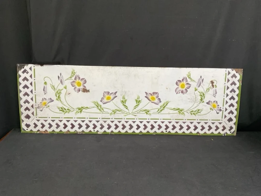 A French art nouveau enamel splashback with stencilled decoration