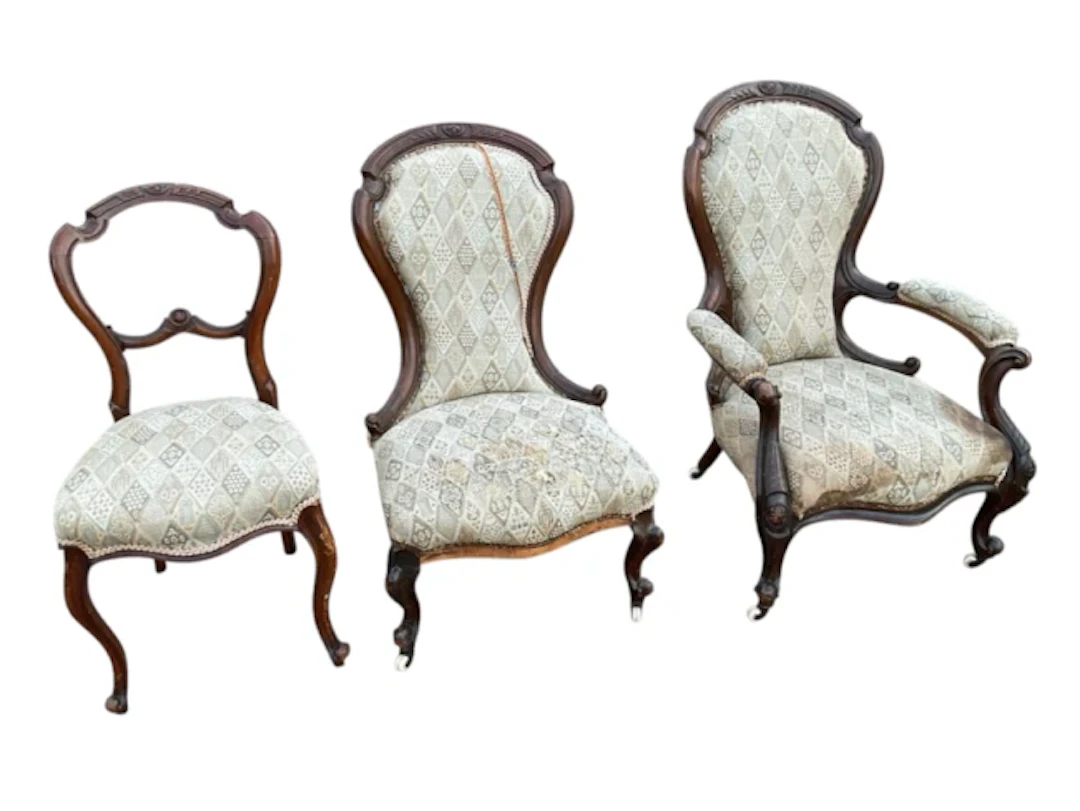 A lady & gents Victorian pair of spoonback carved chairs with moulded