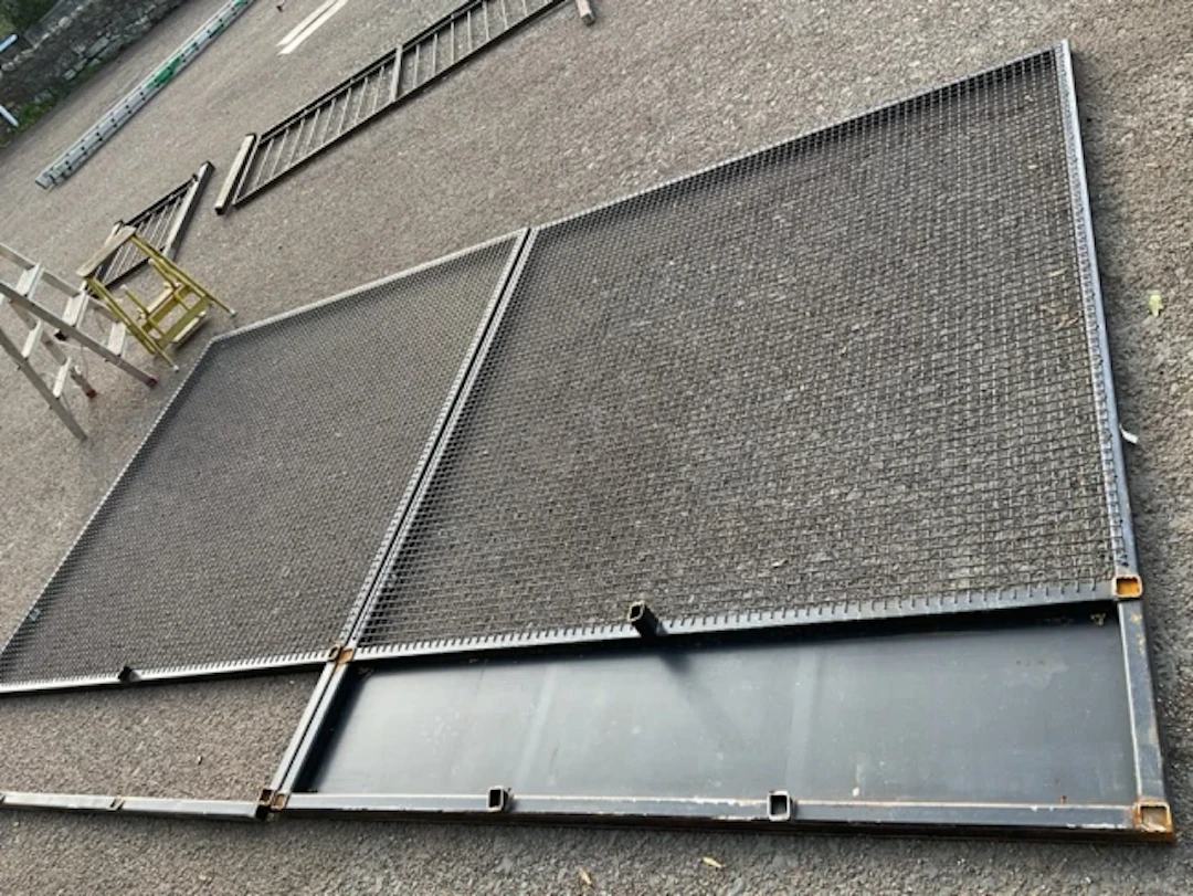 Two large mesh panels on square metal frames, one with base plate.