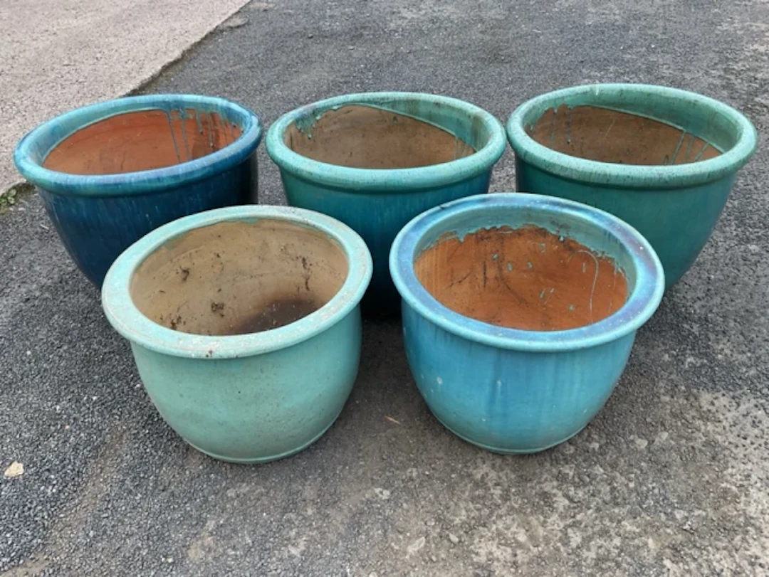 Five turquoise & blue glazed stoneware garden pots with moulded rims.