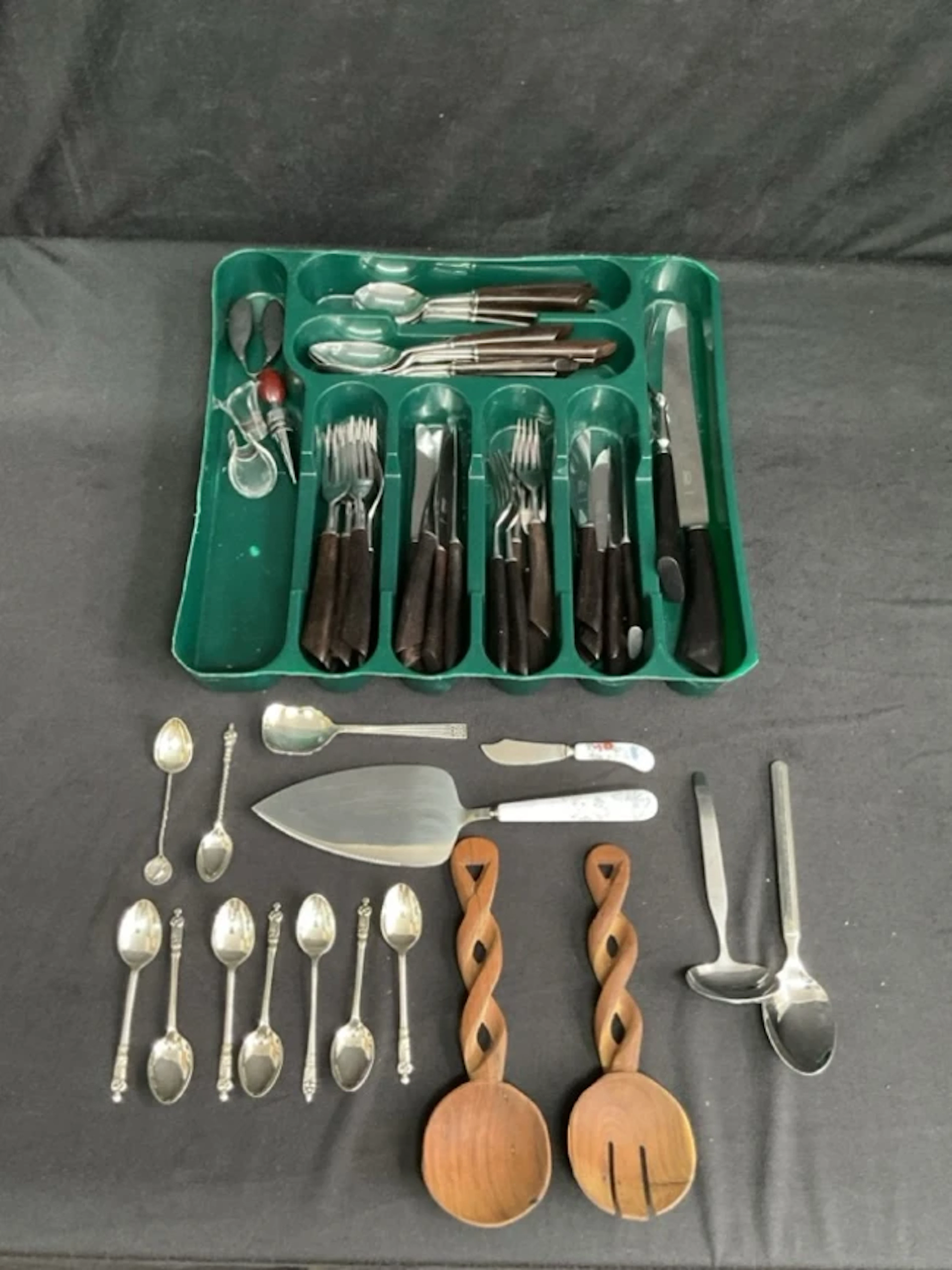 A canteen of contemporary stainless steel cutlery with rosewood handles