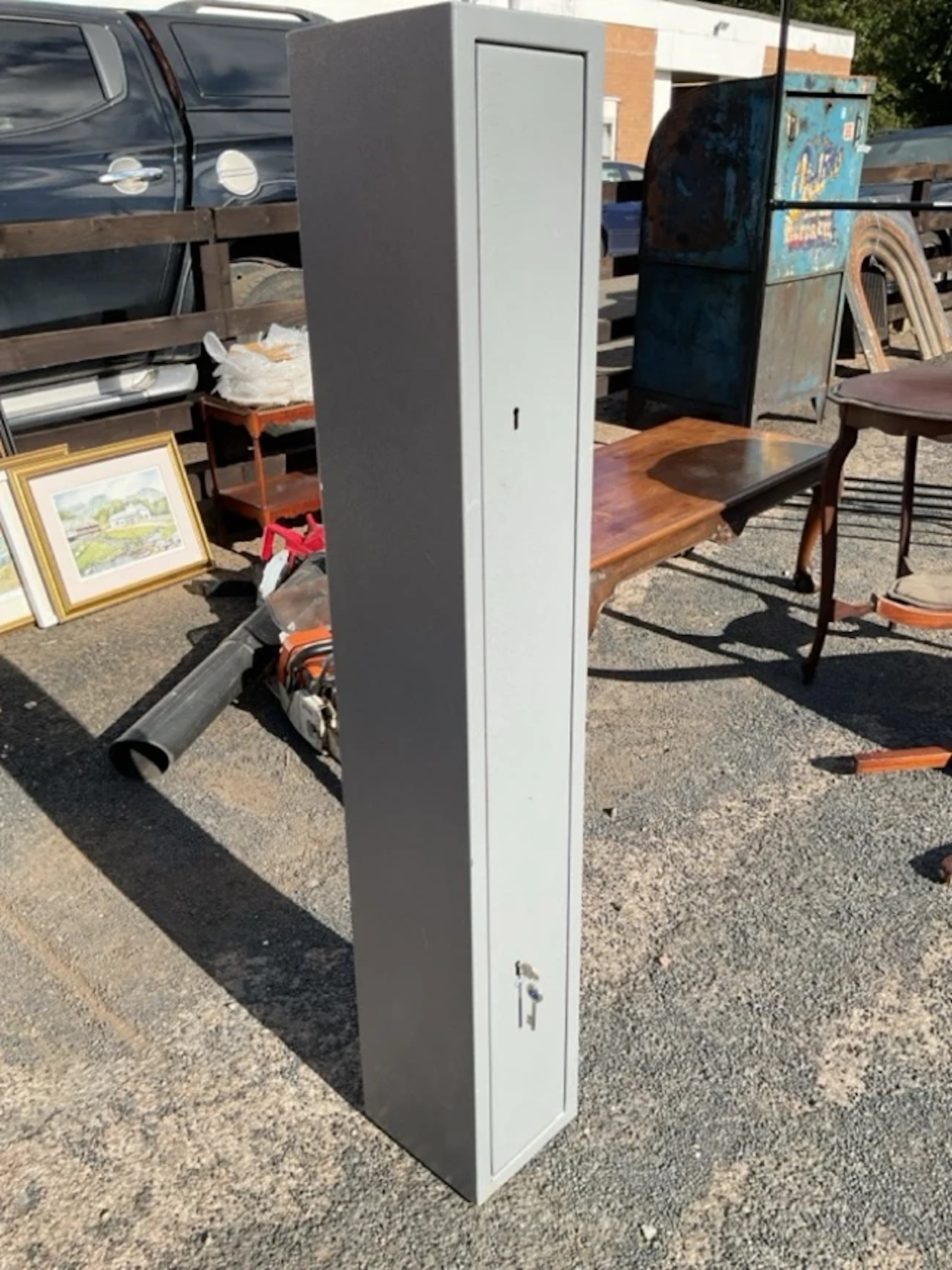 A powder coated steel gun cabinet with two mortice locks & keys. (8in