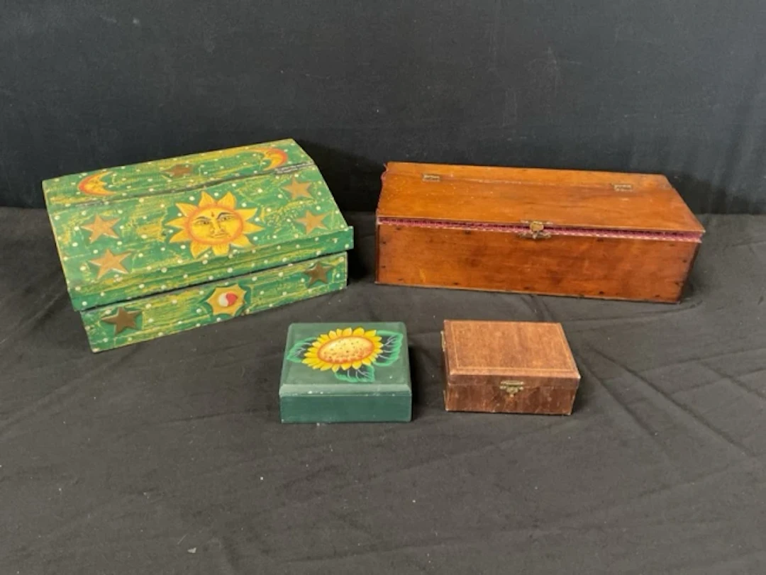 A painted pine writing slope with hinged sloped front decorated with