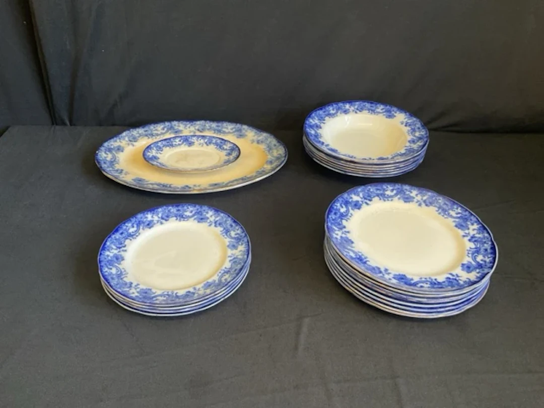 A Victorian Doulton Burslem flow blue dinner service decorated with