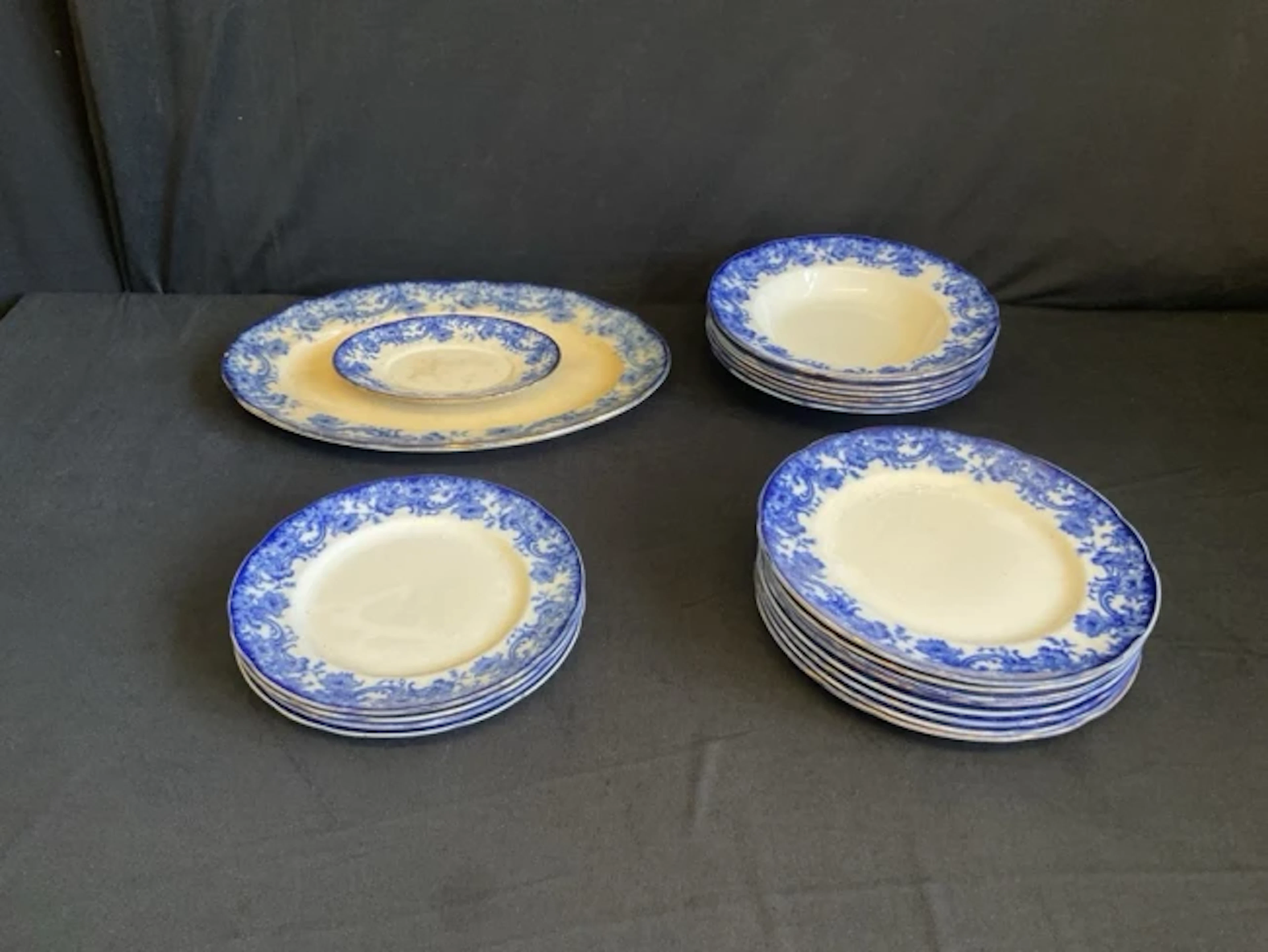 A Victorian Doulton Burslem flow blue dinner service decorated with