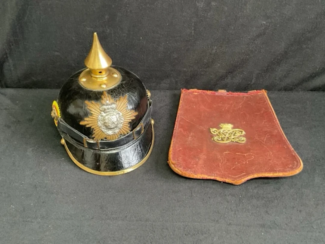 A German WWI, leather Saxon infantry Pickelhaube helmet with brass