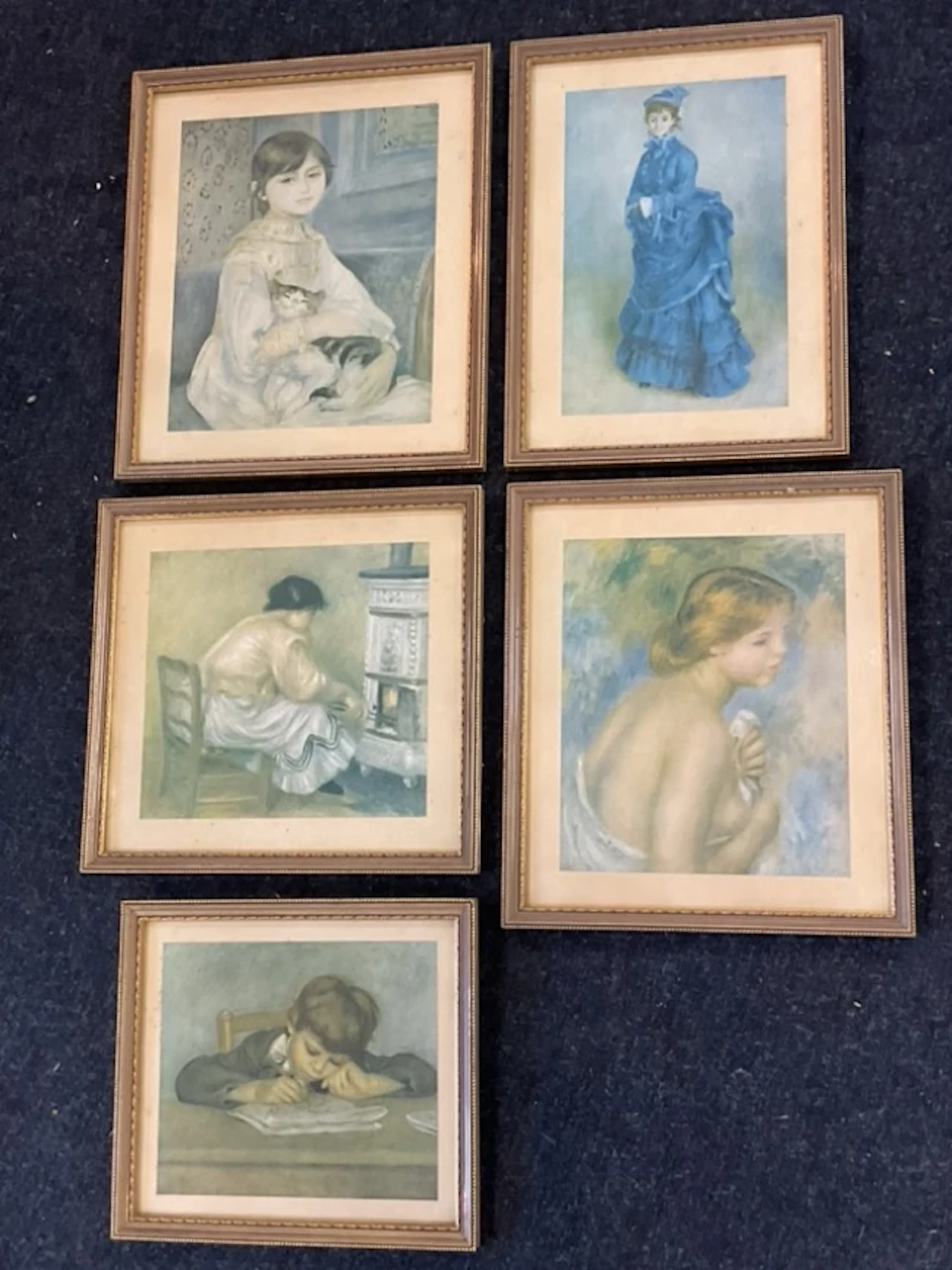 Five coloured prints after paintings by Renoir, framed. (5)