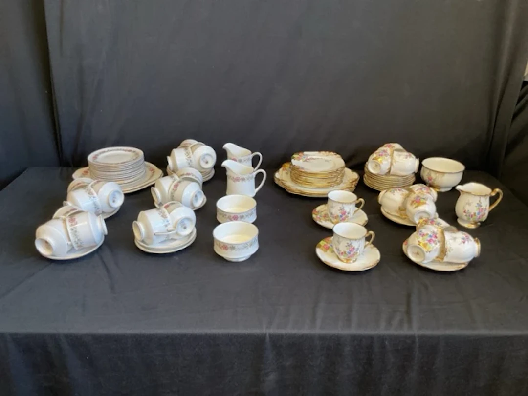 A Paragon porcelain tea service with floral borders in the Belinda