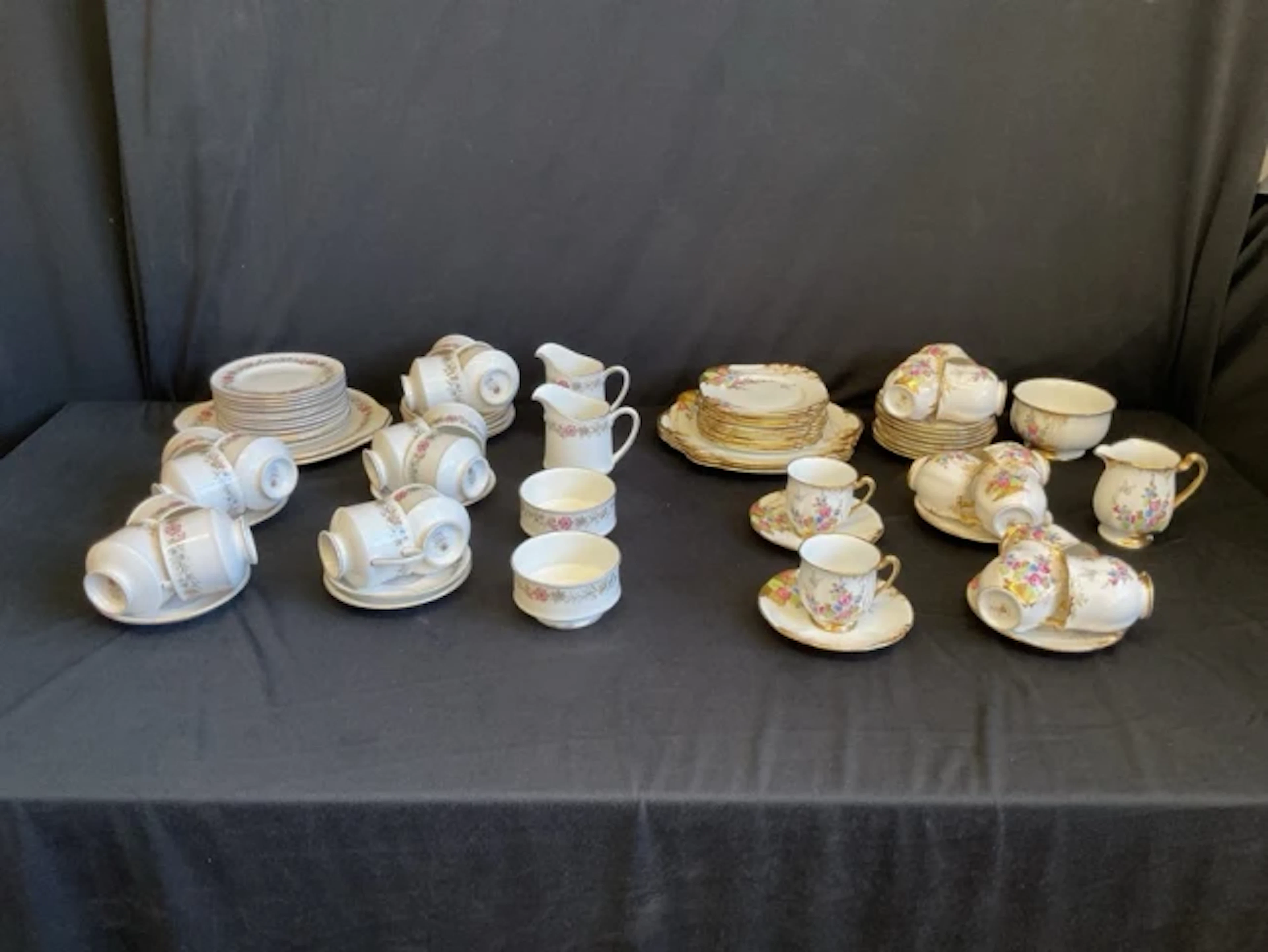 A Paragon porcelain tea service with floral borders in the Belinda
