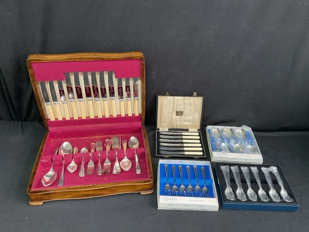An oak cased canteen of silver plated Old English pattern cutlery