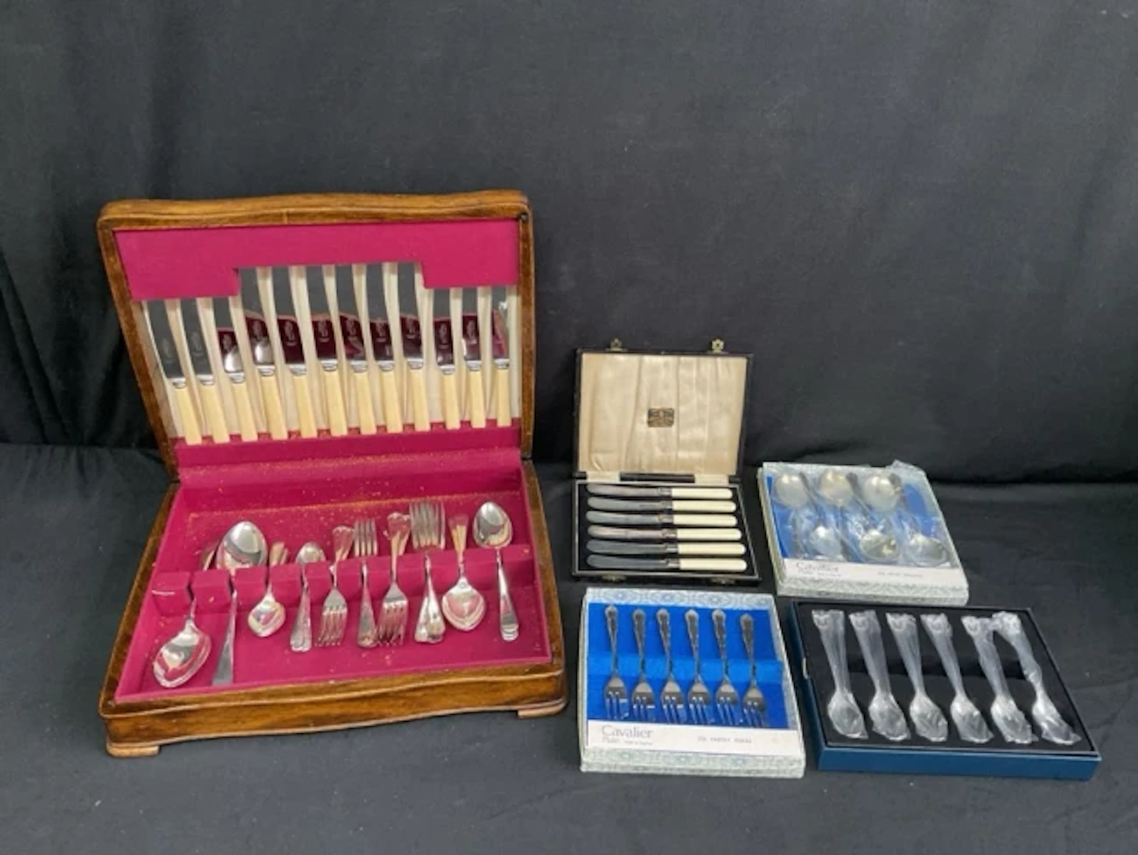 An oak cased canteen of silver plated Old English pattern cutlery