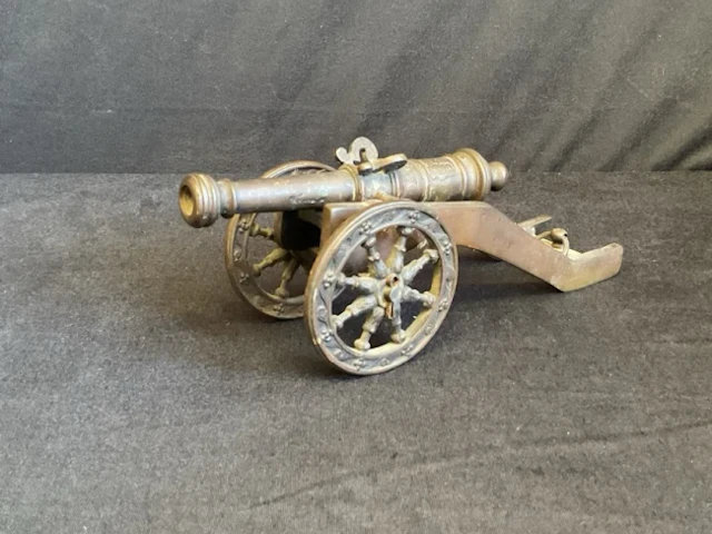 A renaissance style bronze cannon with tapered banded barrel cast