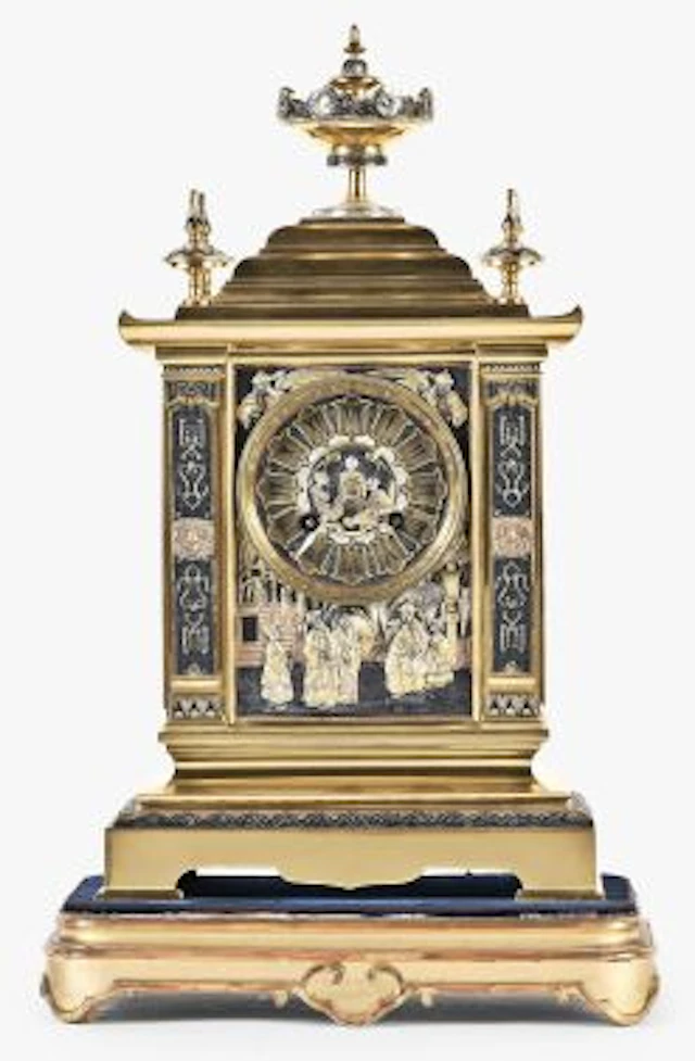 An unusual late 19th century French mantel clock with Japanesque ornament
