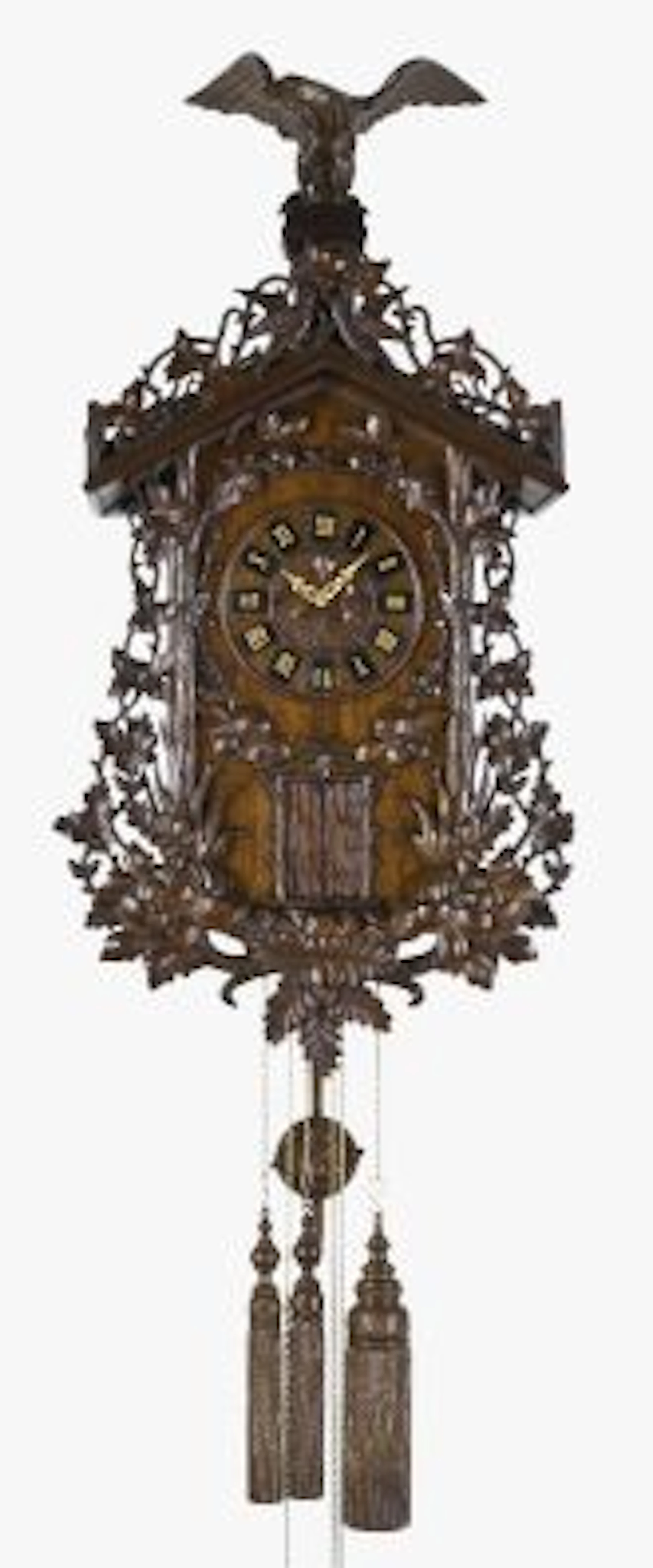 A large late 19th century oak Black Forest two tune hanging trumpeter