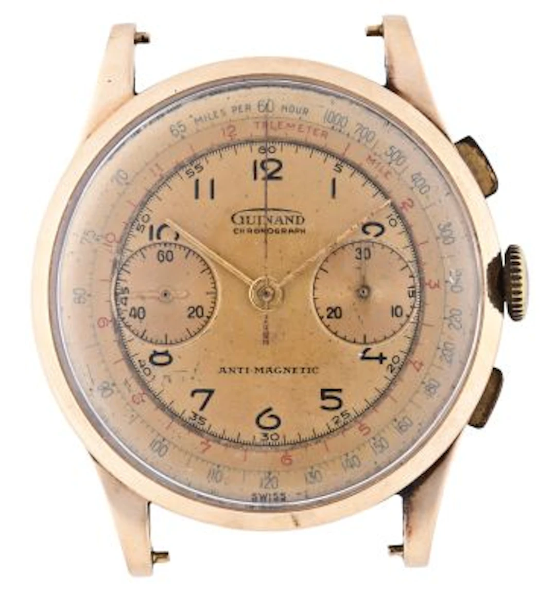 A large mid 20th century gold wrist chronograph by Guinand
