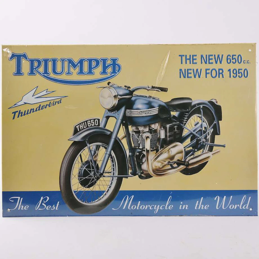 Plåtskylt Triumph