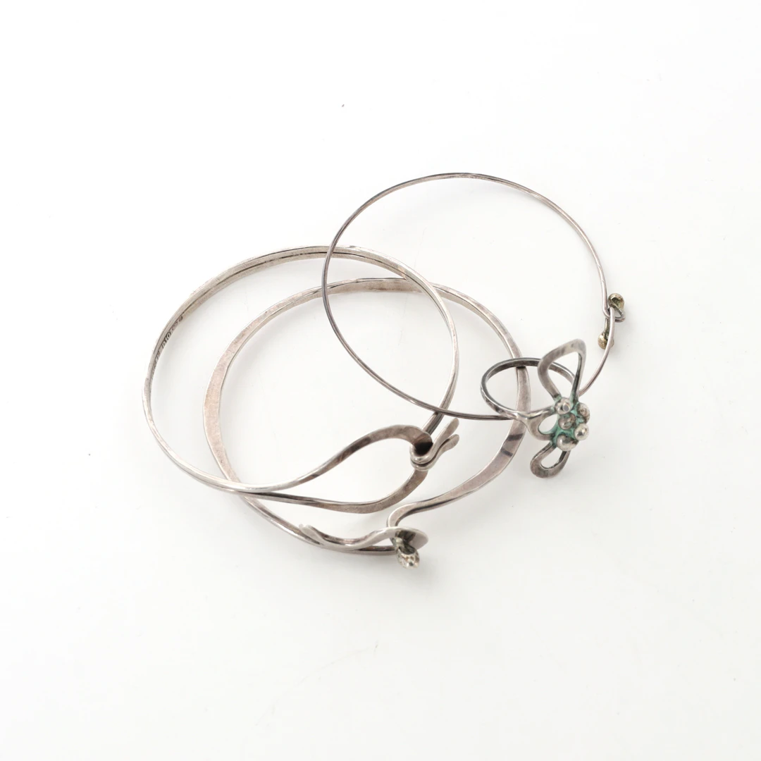 BIRGITTA SANITATE. Silversmycken, 4 delar, armband och ring.