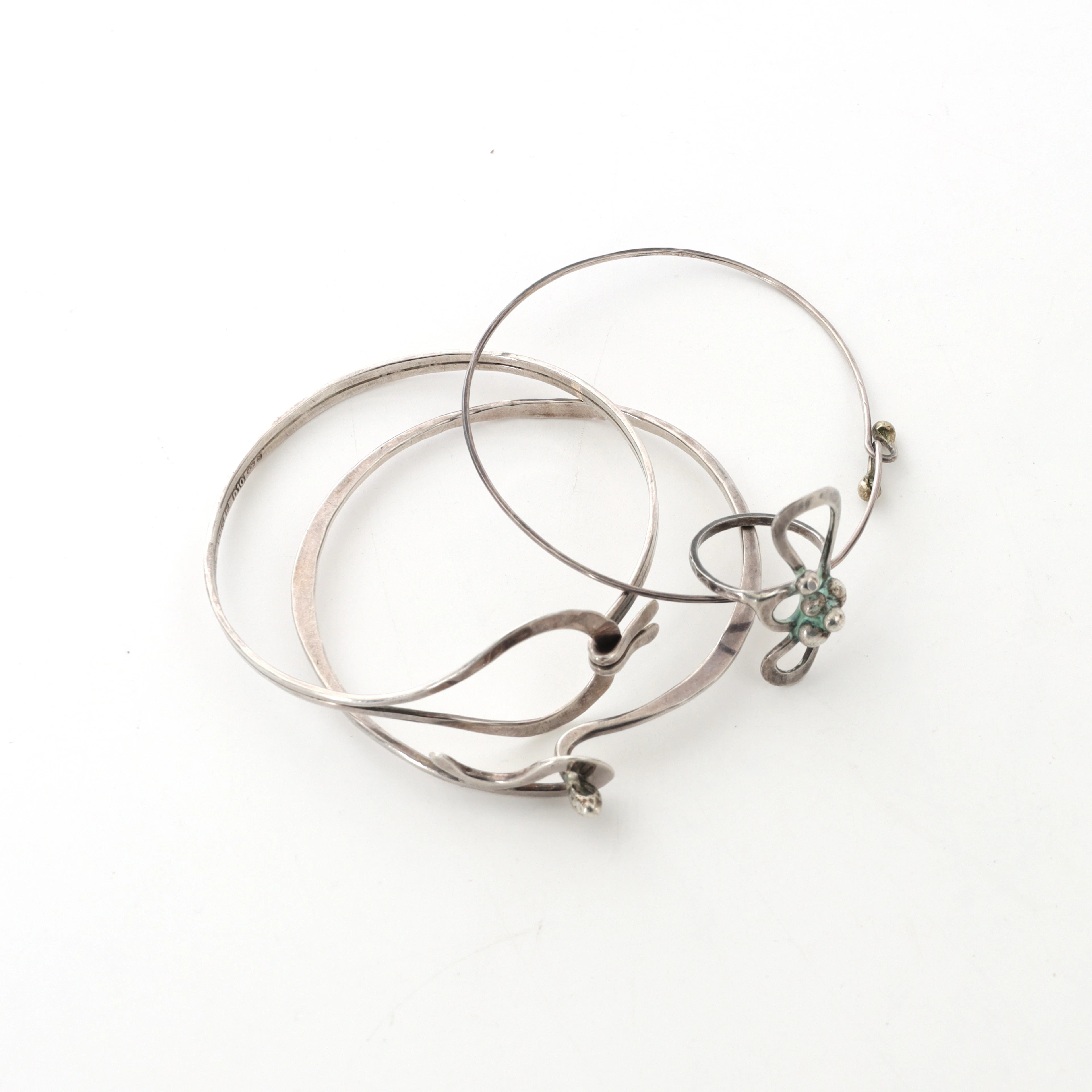 BIRGITTA SANITATE. Silversmycken, 4 delar, armband och ring.