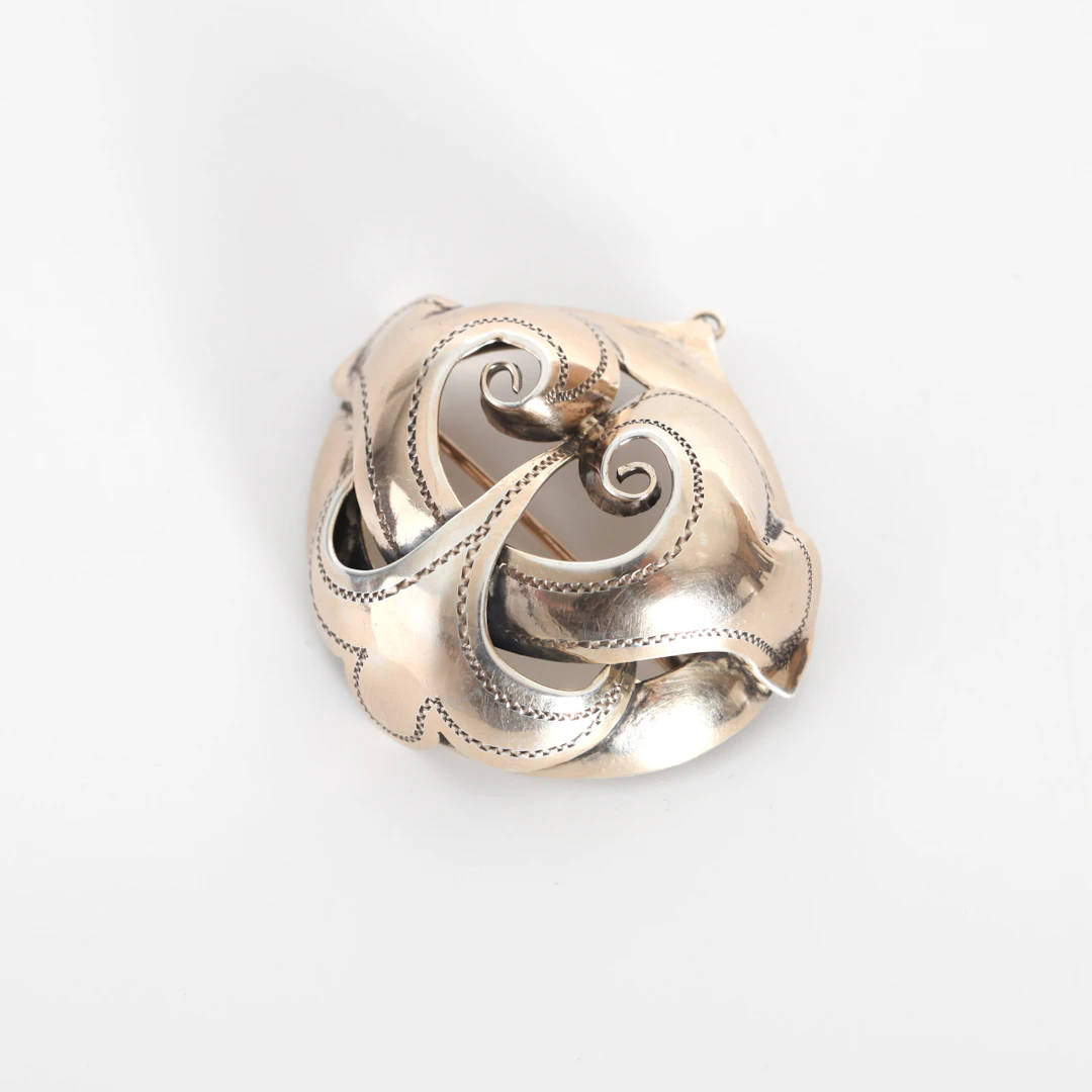 DRÄKTSMYCKE, silver, 1949.