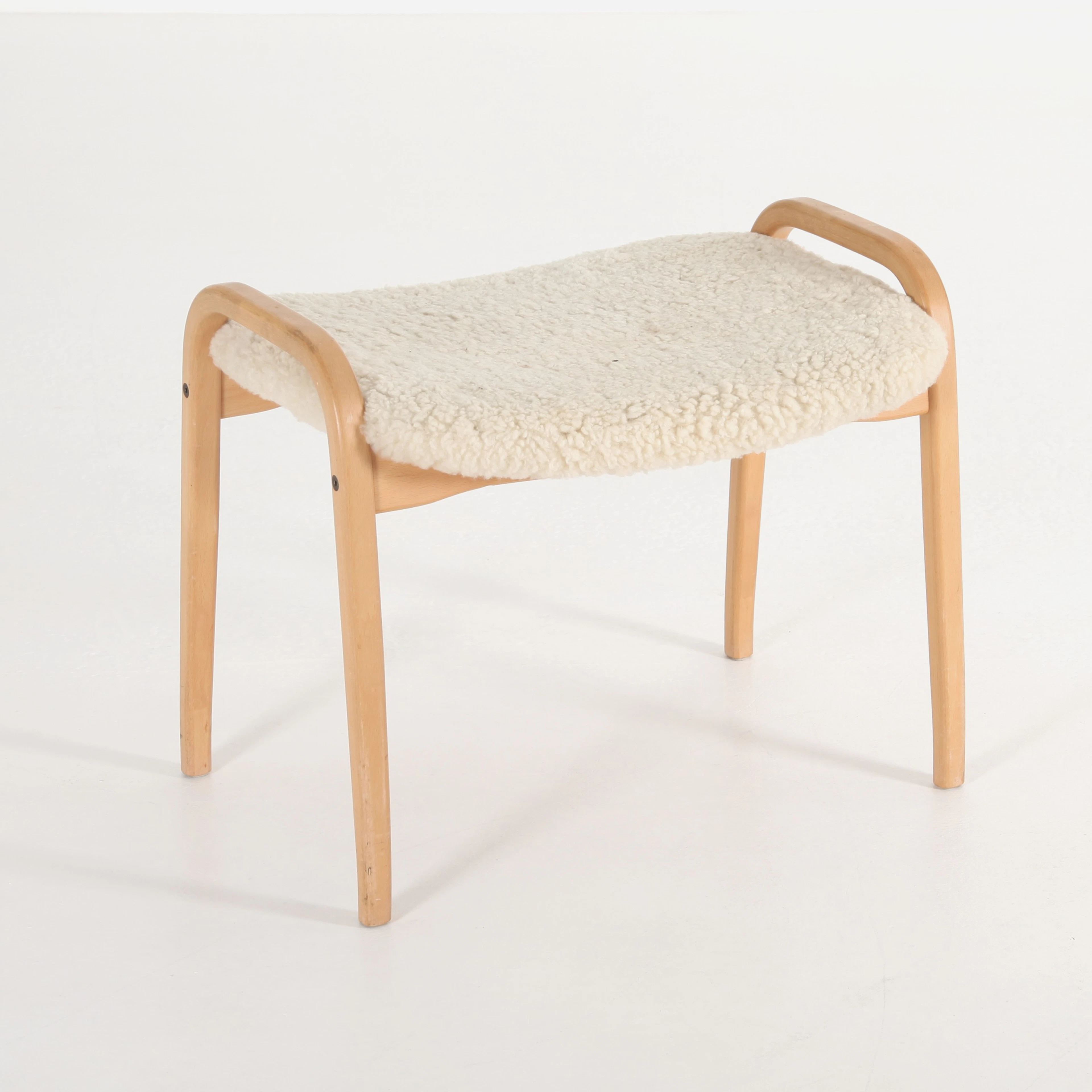 YNGVE EKSTRÖM. 1913-1988. Fotpall, Lamino.