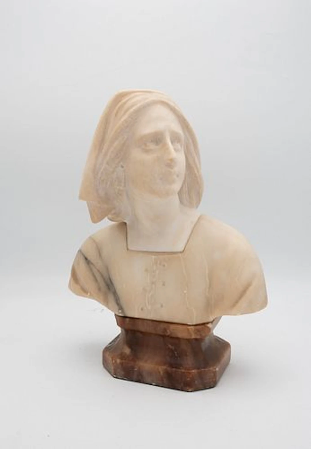 A Carved Alabaster Portrait Bust of Joan of Arc, After Giuseppe Bessi