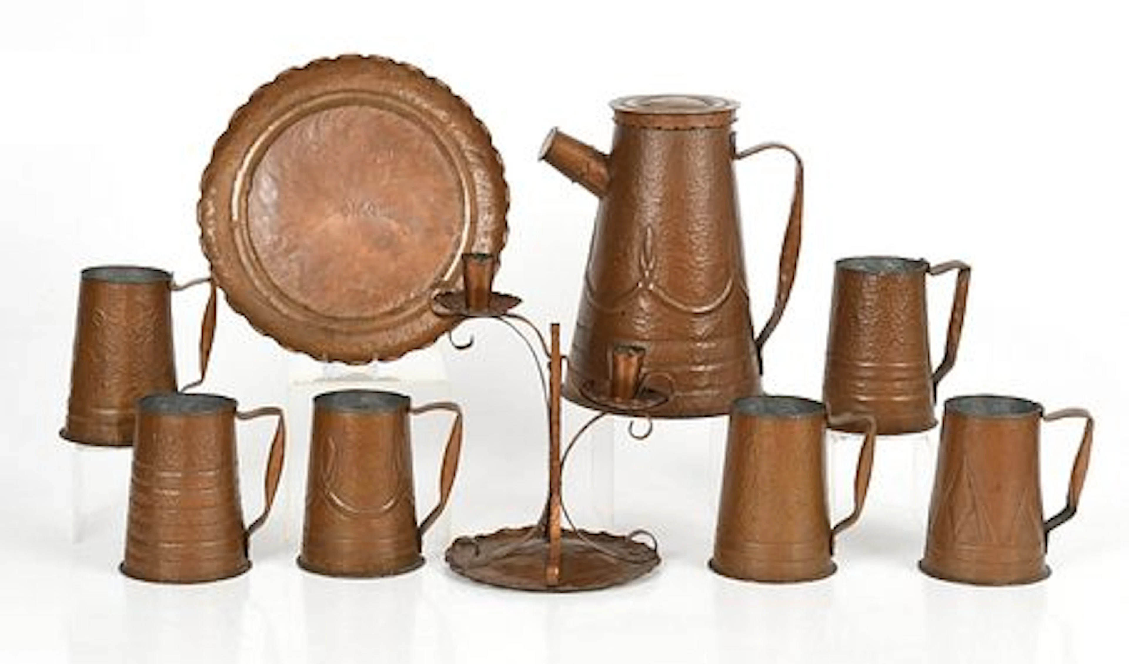 A Collection of Arts and Crafts Hammered Copper Tablewares, John Dewson
