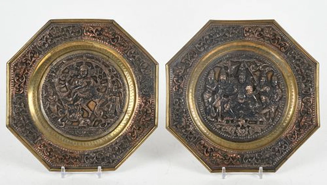 A Pair of Tibetan Brass and Copper Plaques