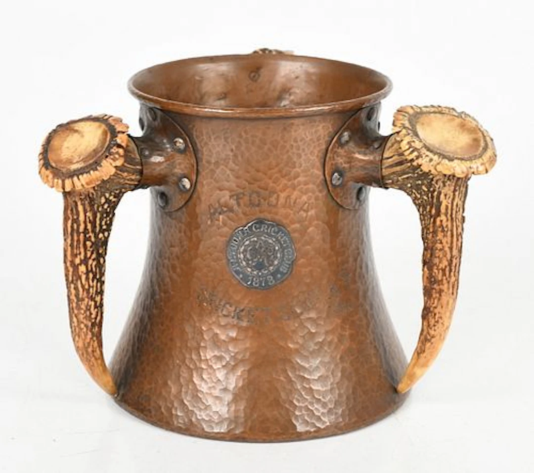 An Antler-Mounted Hammered Copper Golf Trophy from Altoona Cricket