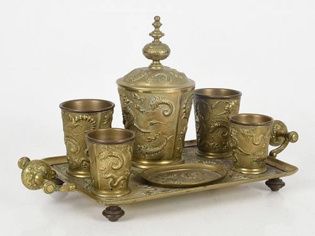 A 19th Century Gilt Brass Smoking Set