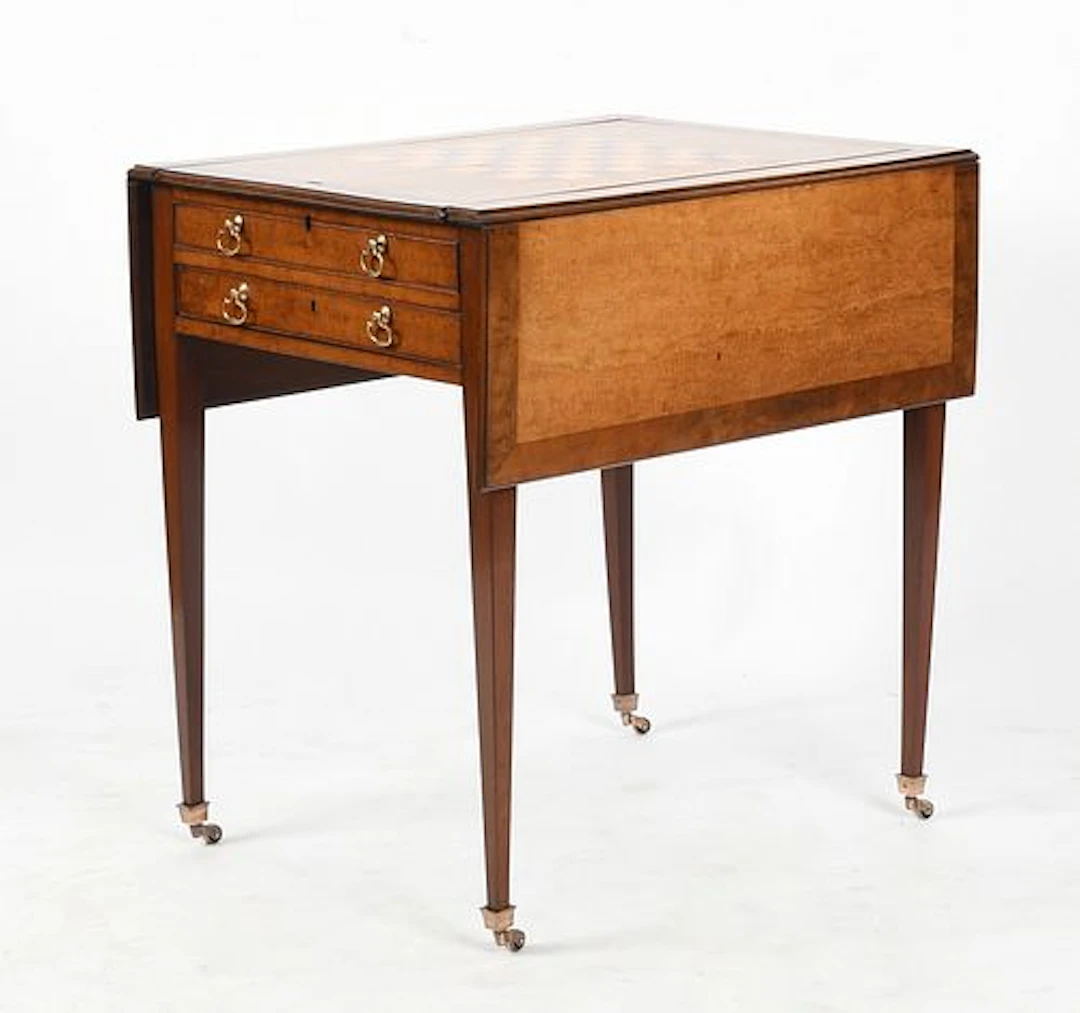 An English Figured-Maple and Walnut Drop-Leaf Games Table, Early 20th Century