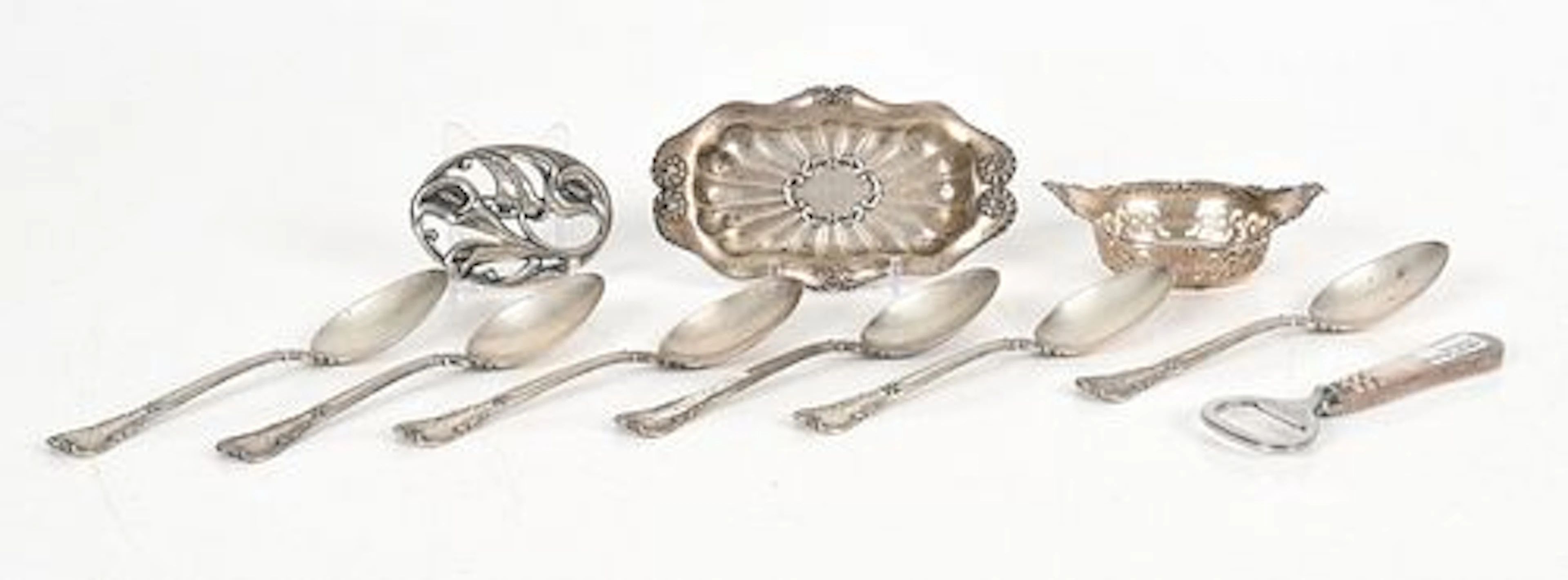 A Group of Sterling Tableware and a Pin