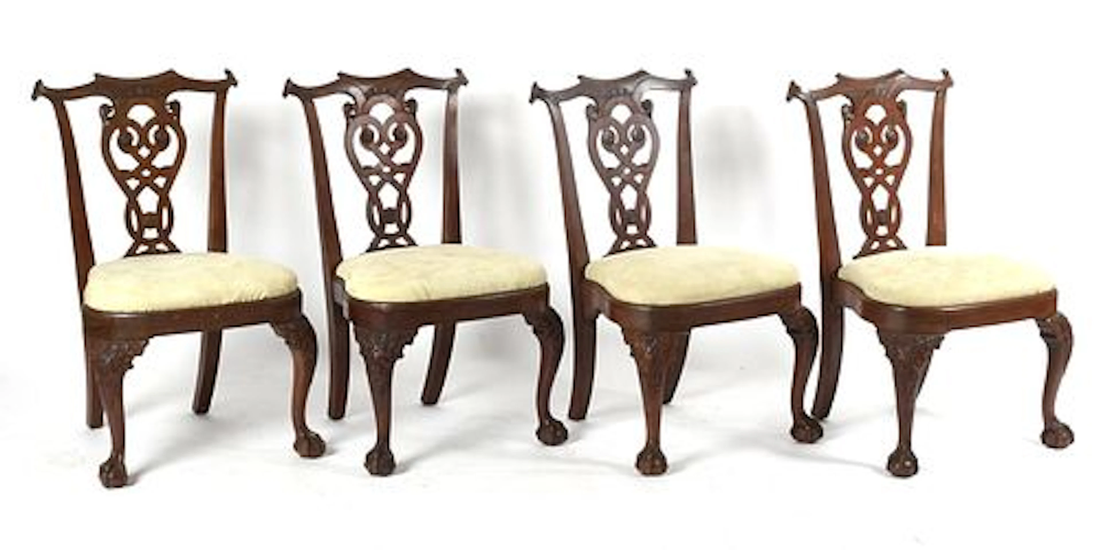 A Set of Four Chippendale-Style Carved Mahogany Side Chairs, c. 1900
