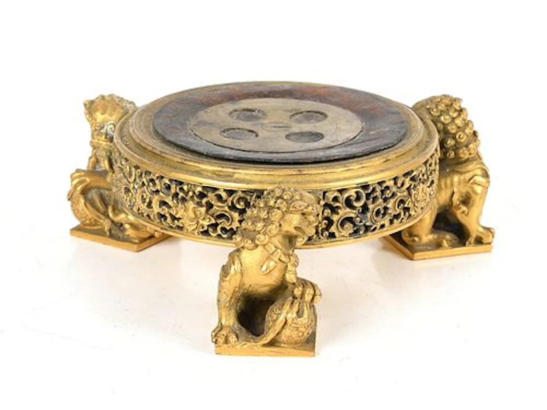 A Chinese Gilt Metal Stand