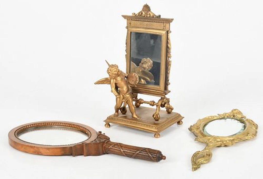 A "Painting Putto" Desk Mirror