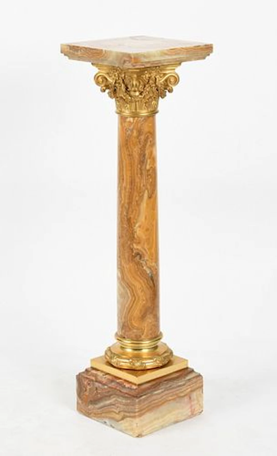 A French Gilt-Metal-Mounted Onyx Pedestal Column, First Half 20th Century