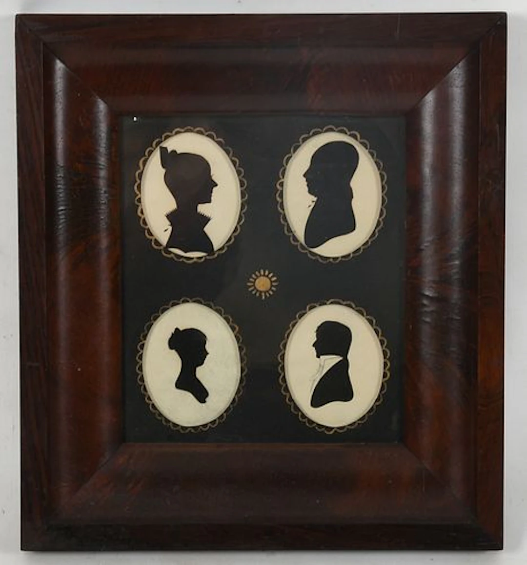 A Group of Four Framed Hollow-Cut Silhouettes of the Avery Family