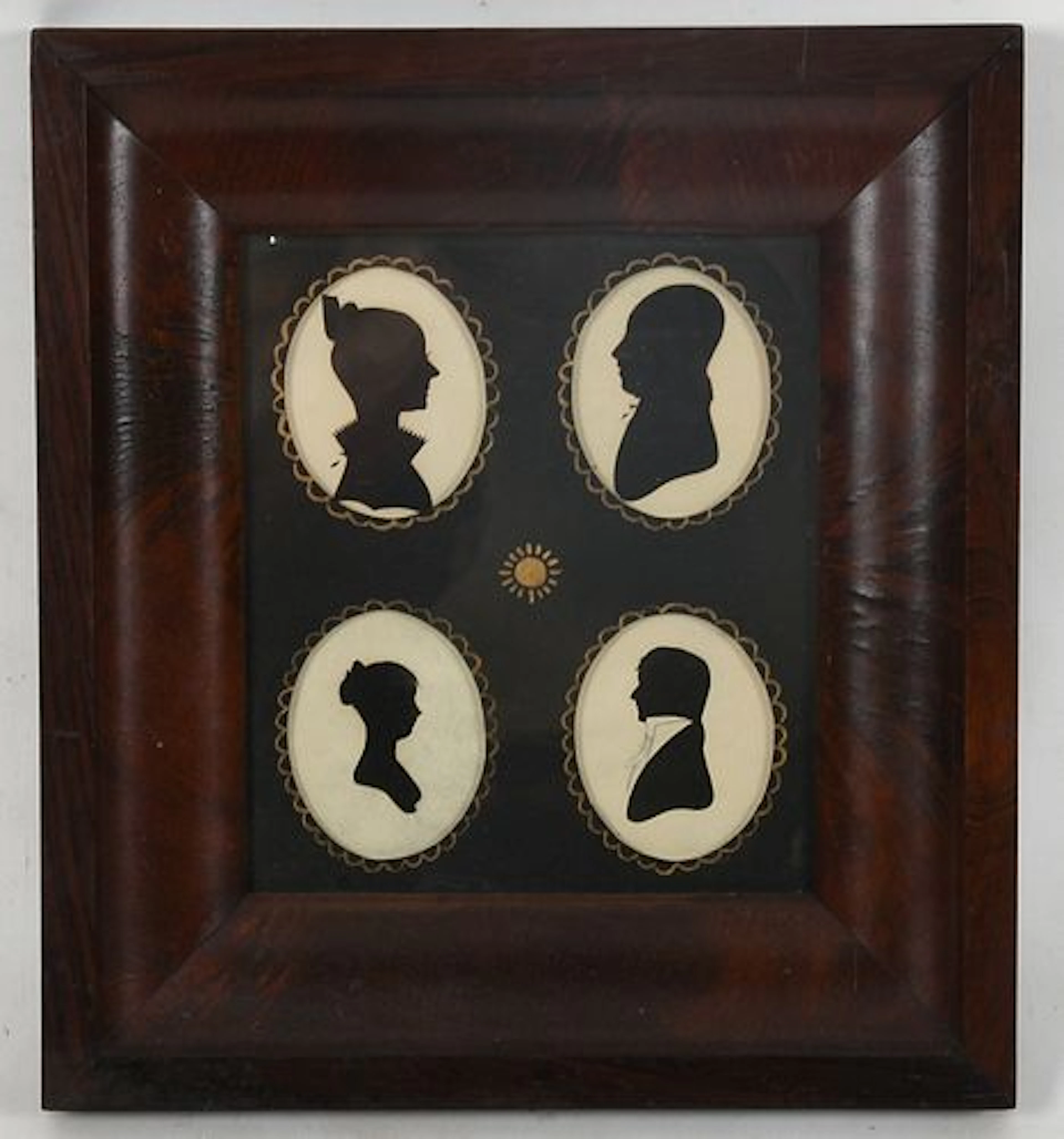 A Group of Four Framed Hollow-Cut Silhouettes of the Avery Family