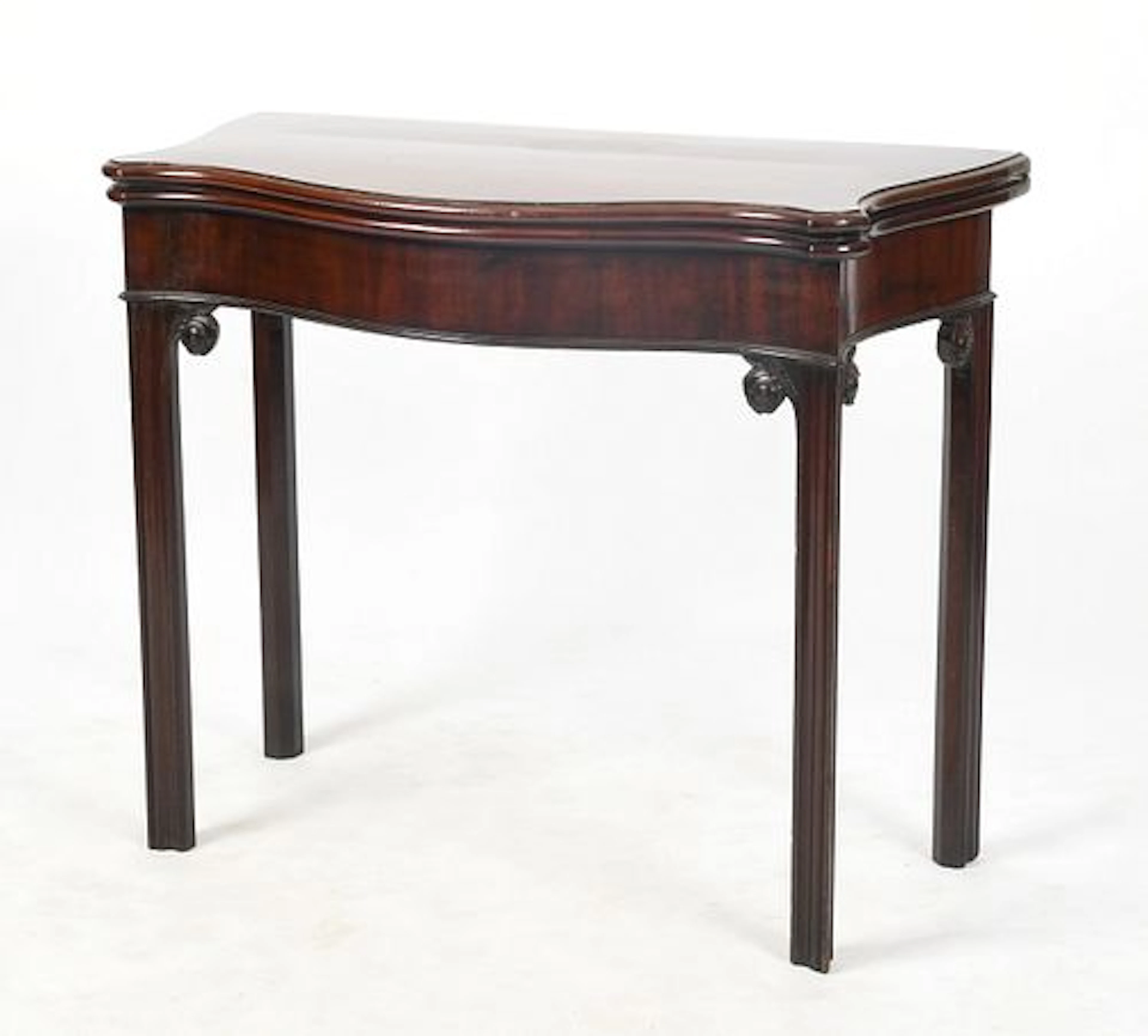 A George III Mahogany Serpentine-Front Fold-Top Games Table, Third