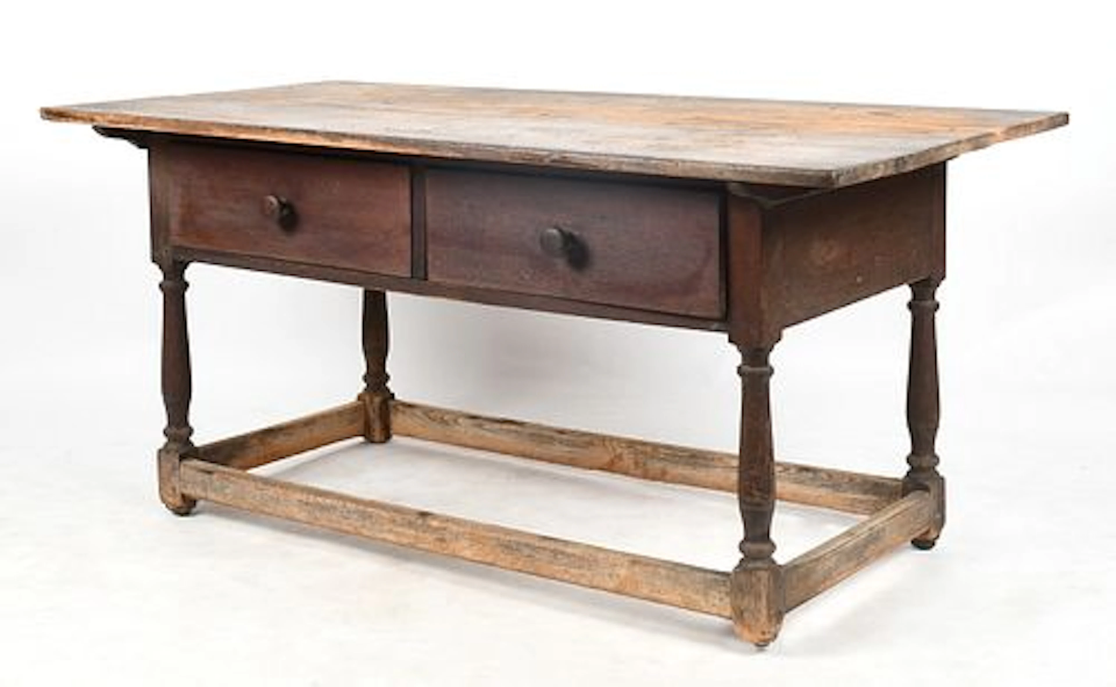 A Pennsylvania Stained Walnut Tavern Table, Early 19th Century
