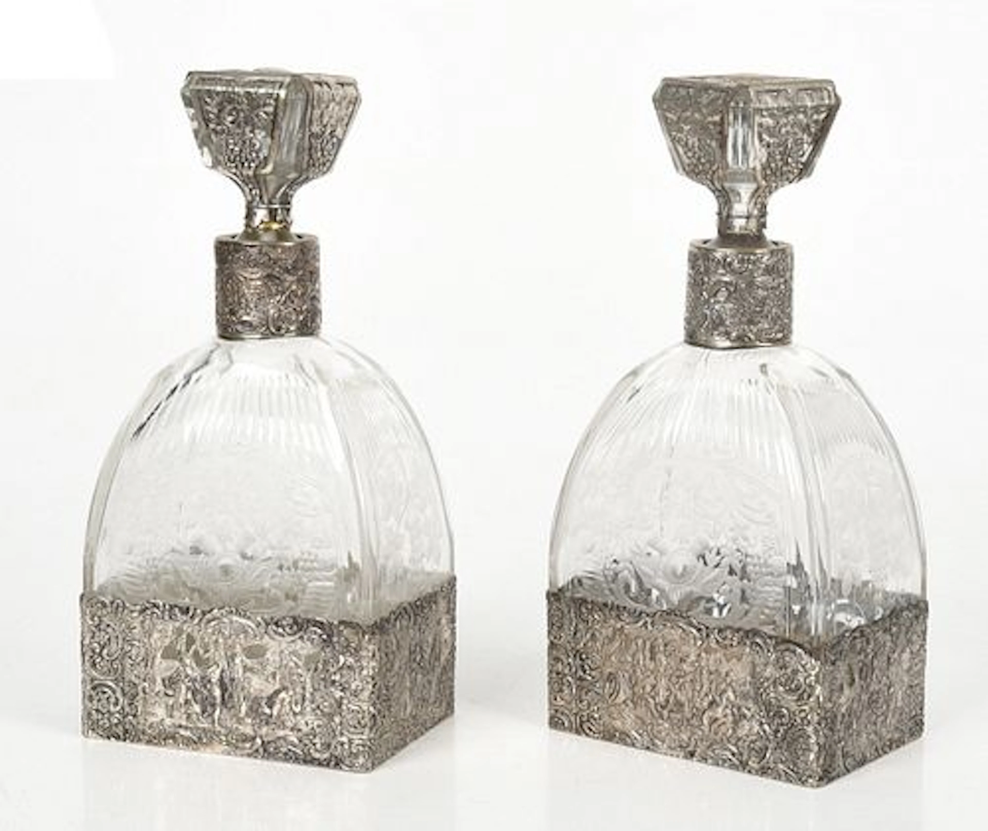 A Pair of Silver Overlay Etched Glass Decanters