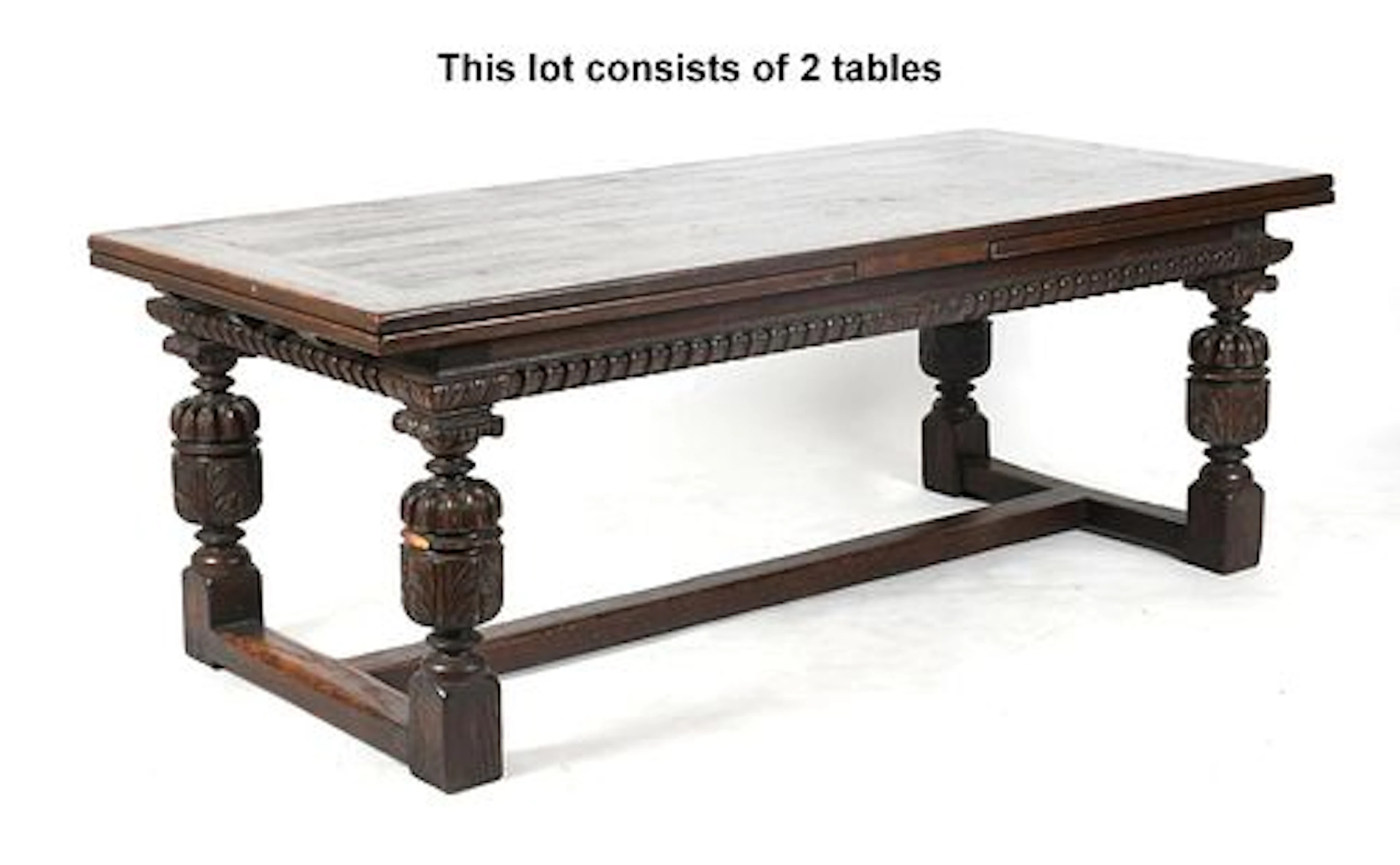 A Pair of Jacobean-Revival Carved Oak Extending Refectory Tables