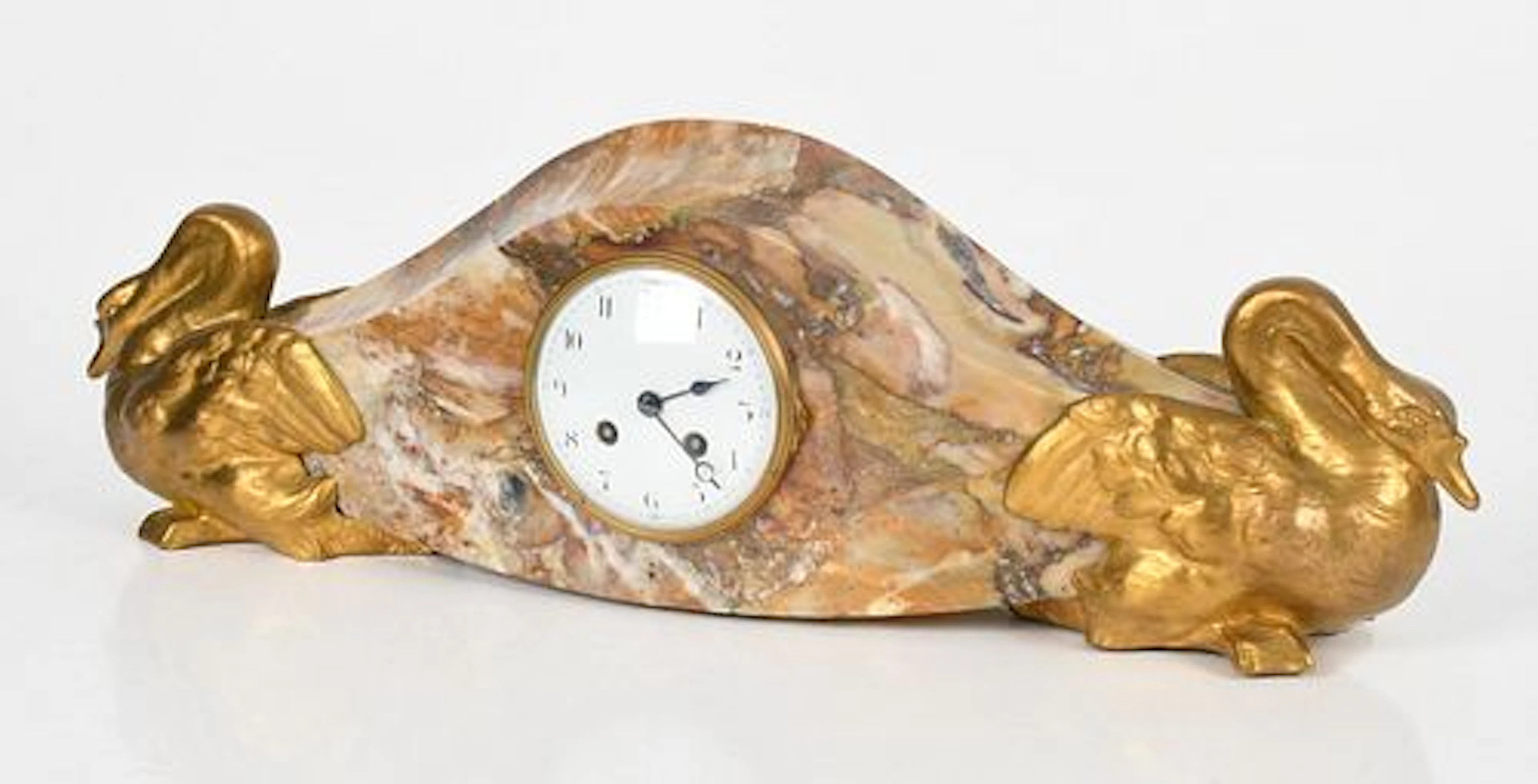 A French Brass and Marble Mantel Clock