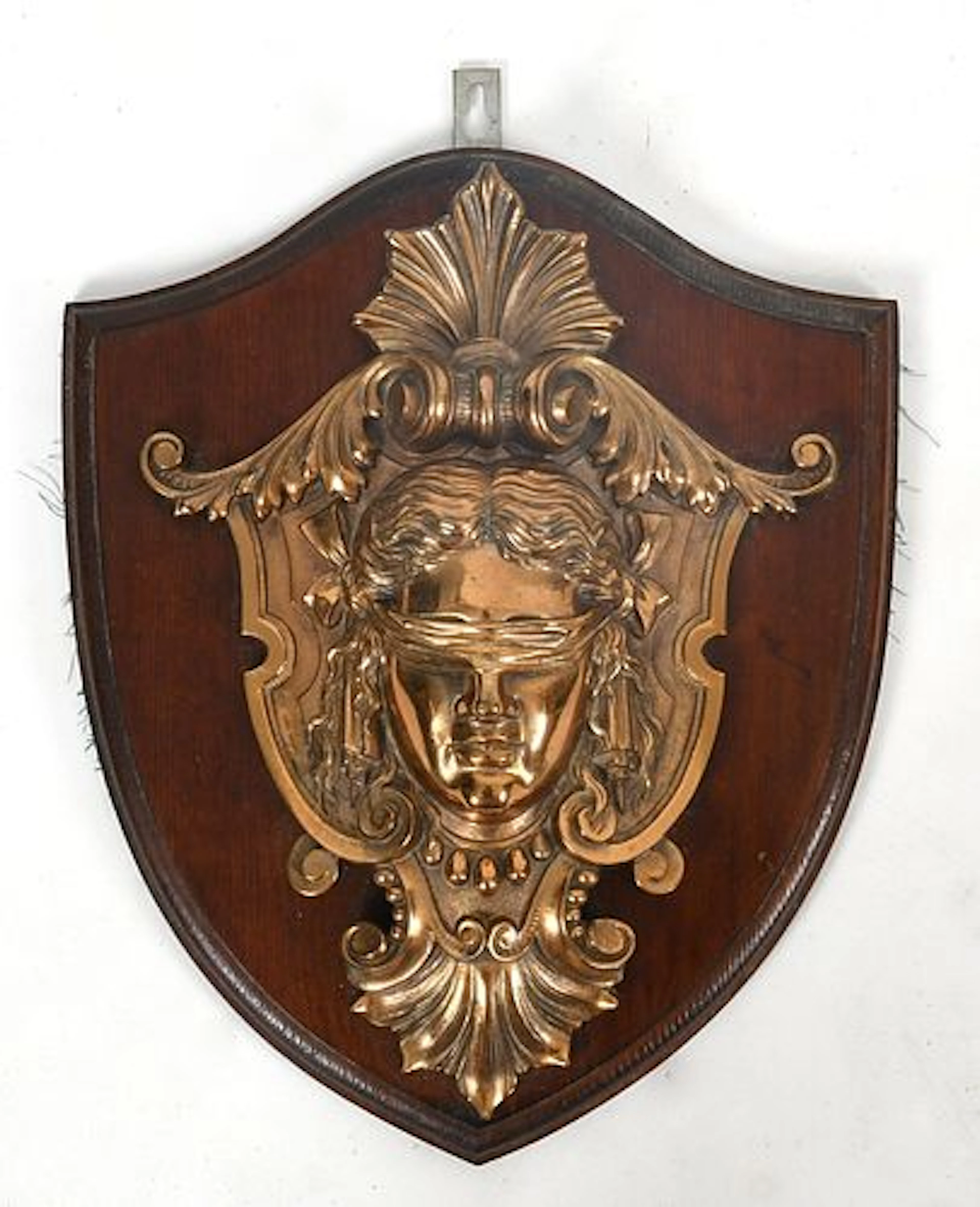 A Patinated-Bronze Plaque of a Blindfolded Face, 20th Century