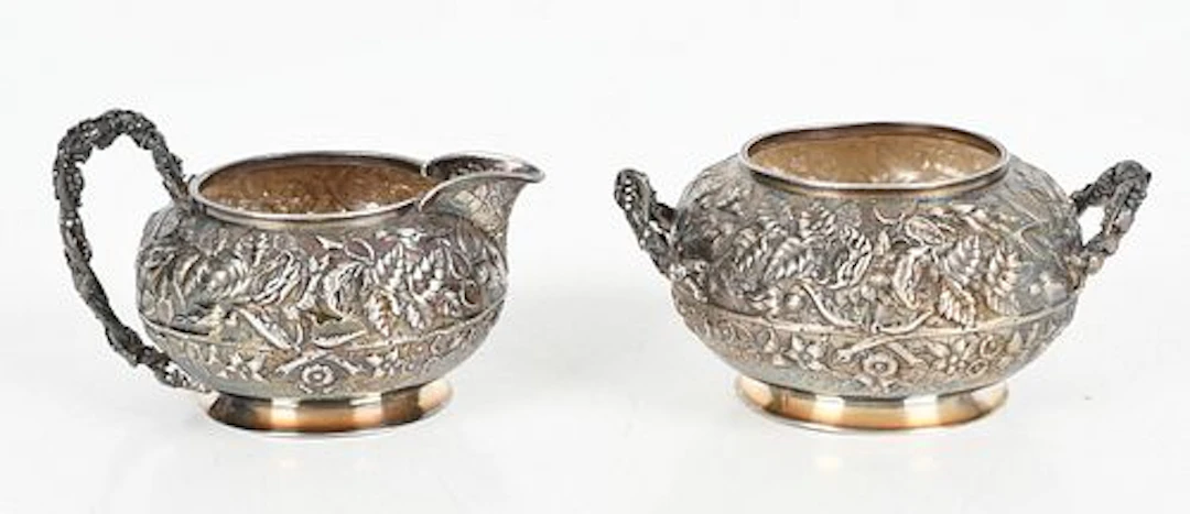 An American Repousse Sterling Silver Creamer and Sugar, Late 19th/