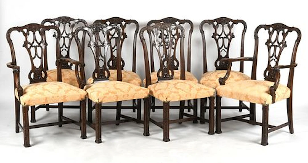 A Set of Eight Chippendale-Style Carved Mahogany Dining Chairs, 20th Century