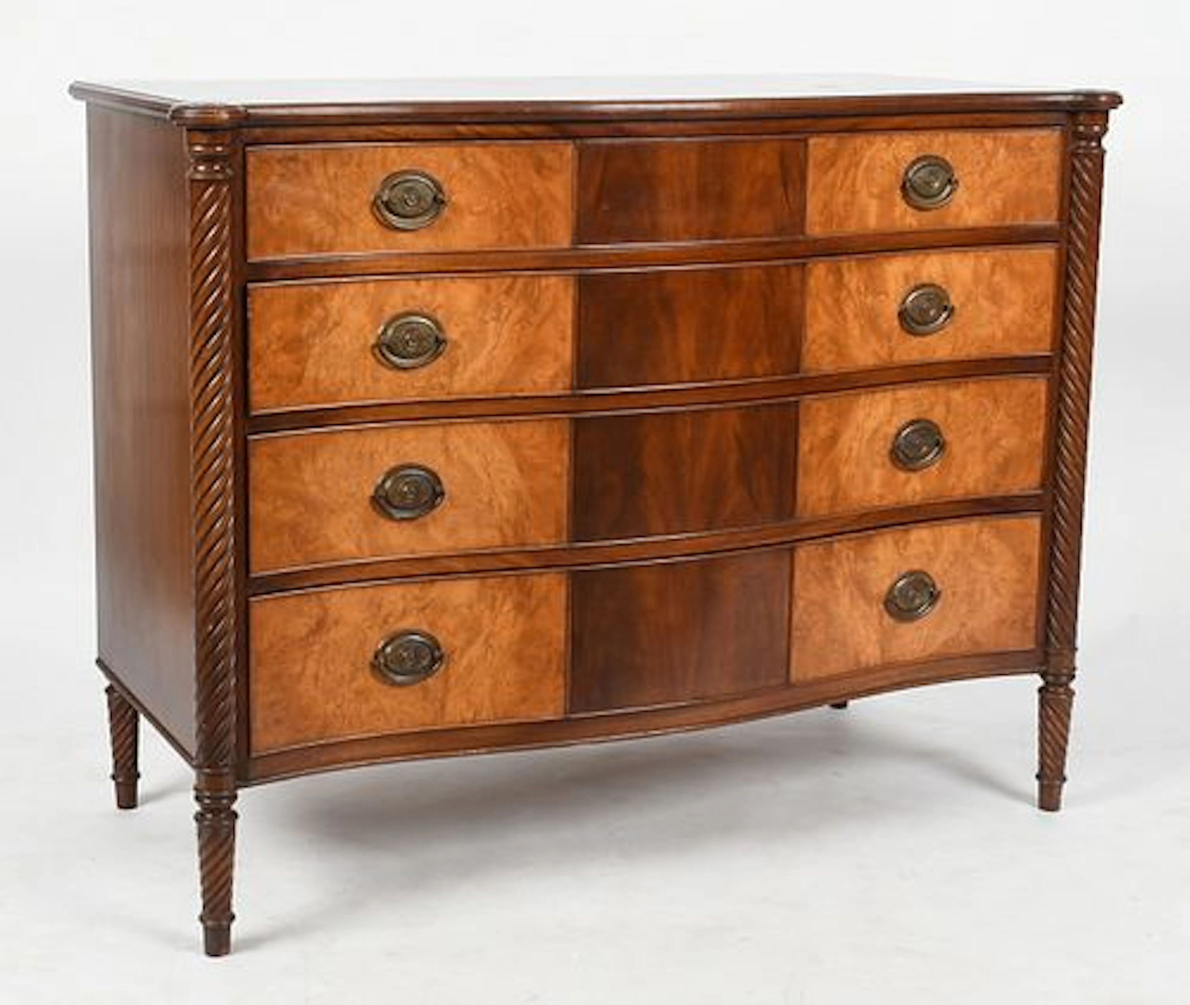 A Federal-Style Walnut and Mahogany Serpentine-Front Chest of Drawers