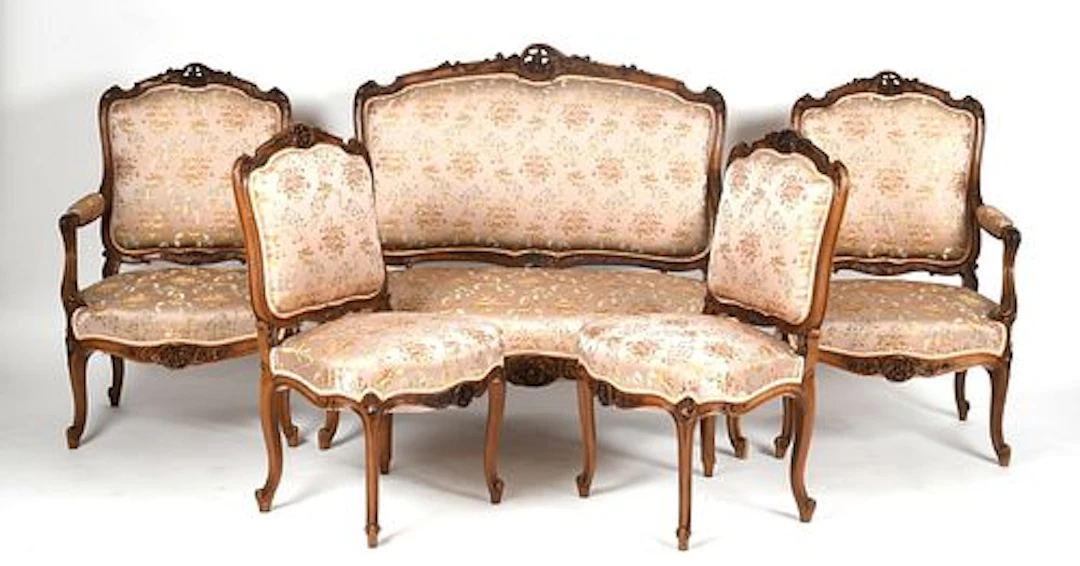 A Louis XV-Style Carved Fruitwood Five-Piece Salon Suite, 20th Century