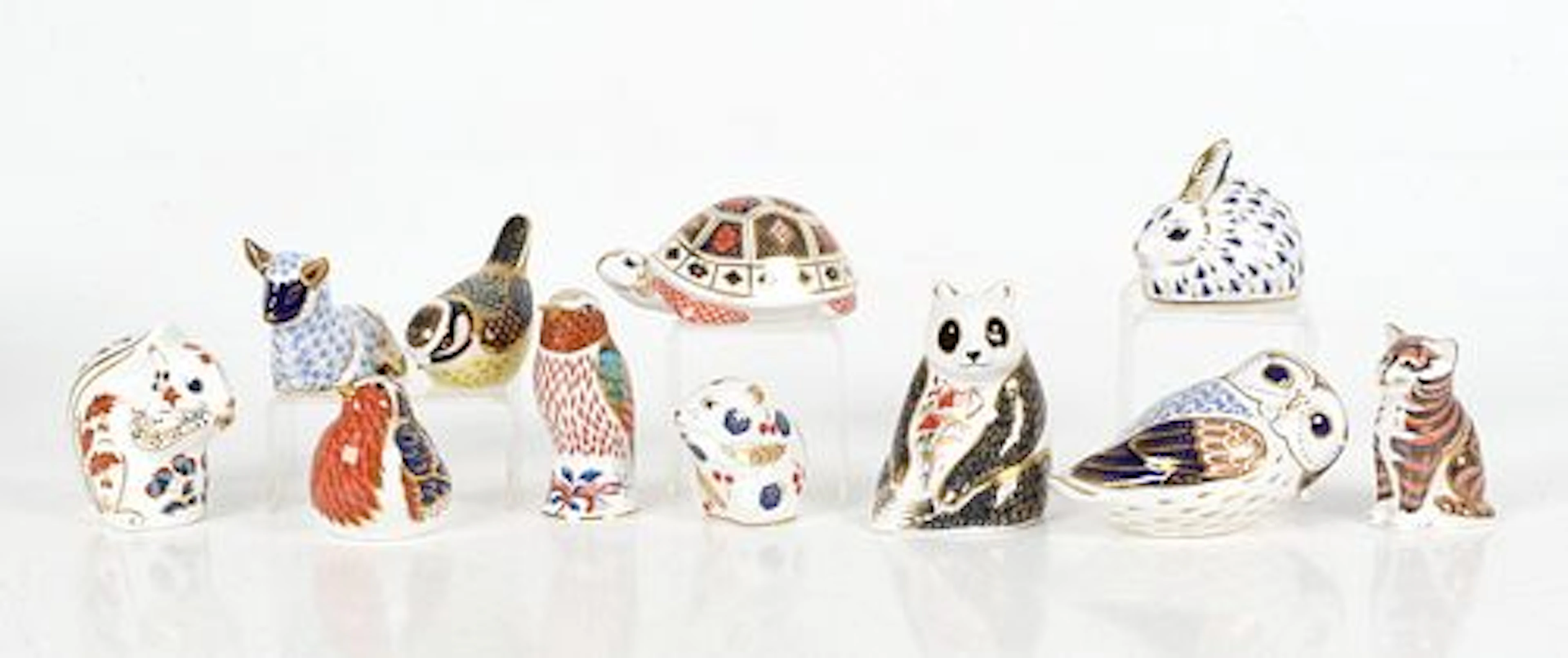 A Collection of Royal Crown Derby Paperweights